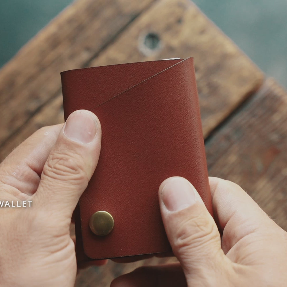 Rollout Wallet has a single pocket for cards, and nicely rolls your cash and secures with a snap